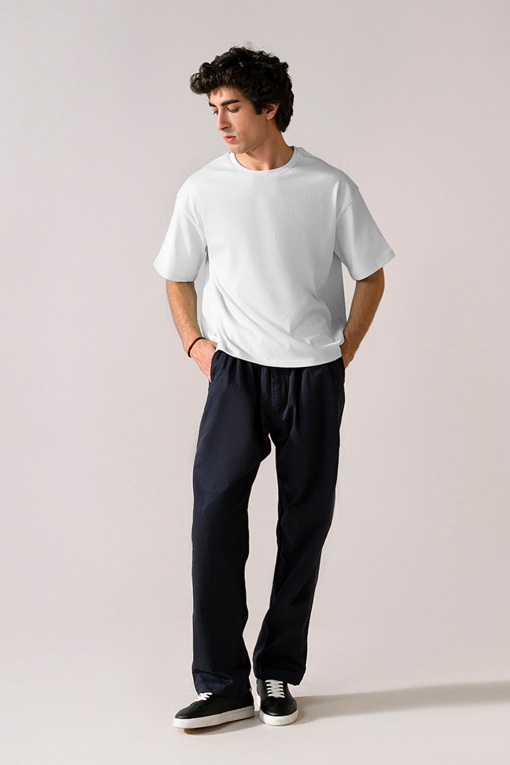 Off-white (cloud dancer) heavy weight cropped t-shirt, full styled look, by SOLA Pakistan.