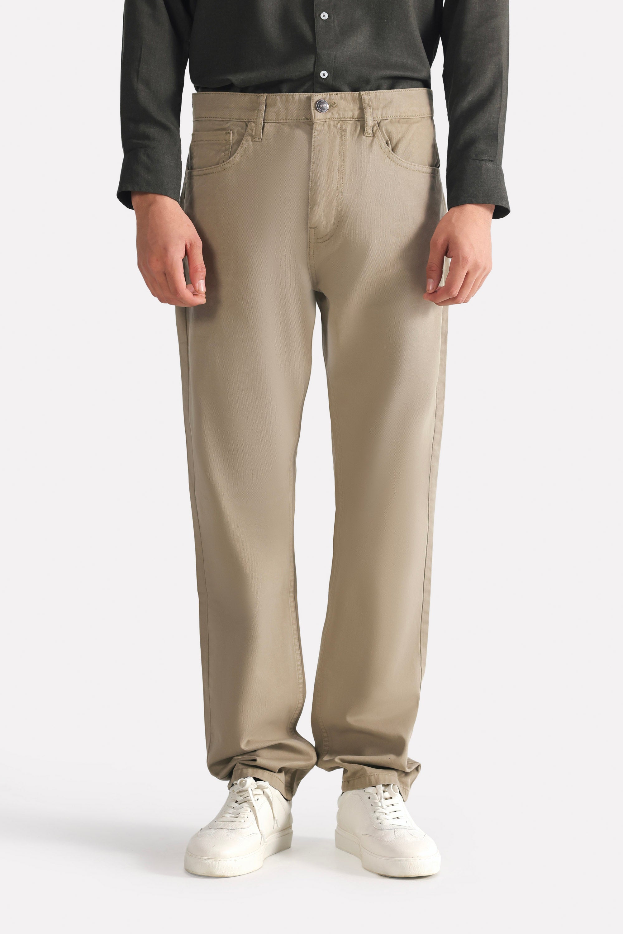 Olive green (autumn green) garment-dyed casual trouser, full styled look, by SOLA Pakistan.