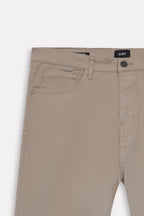 Texture and fabric detail, olive green (autumn green) garment-dyed casual trouser, by SOLA Pakistan.
