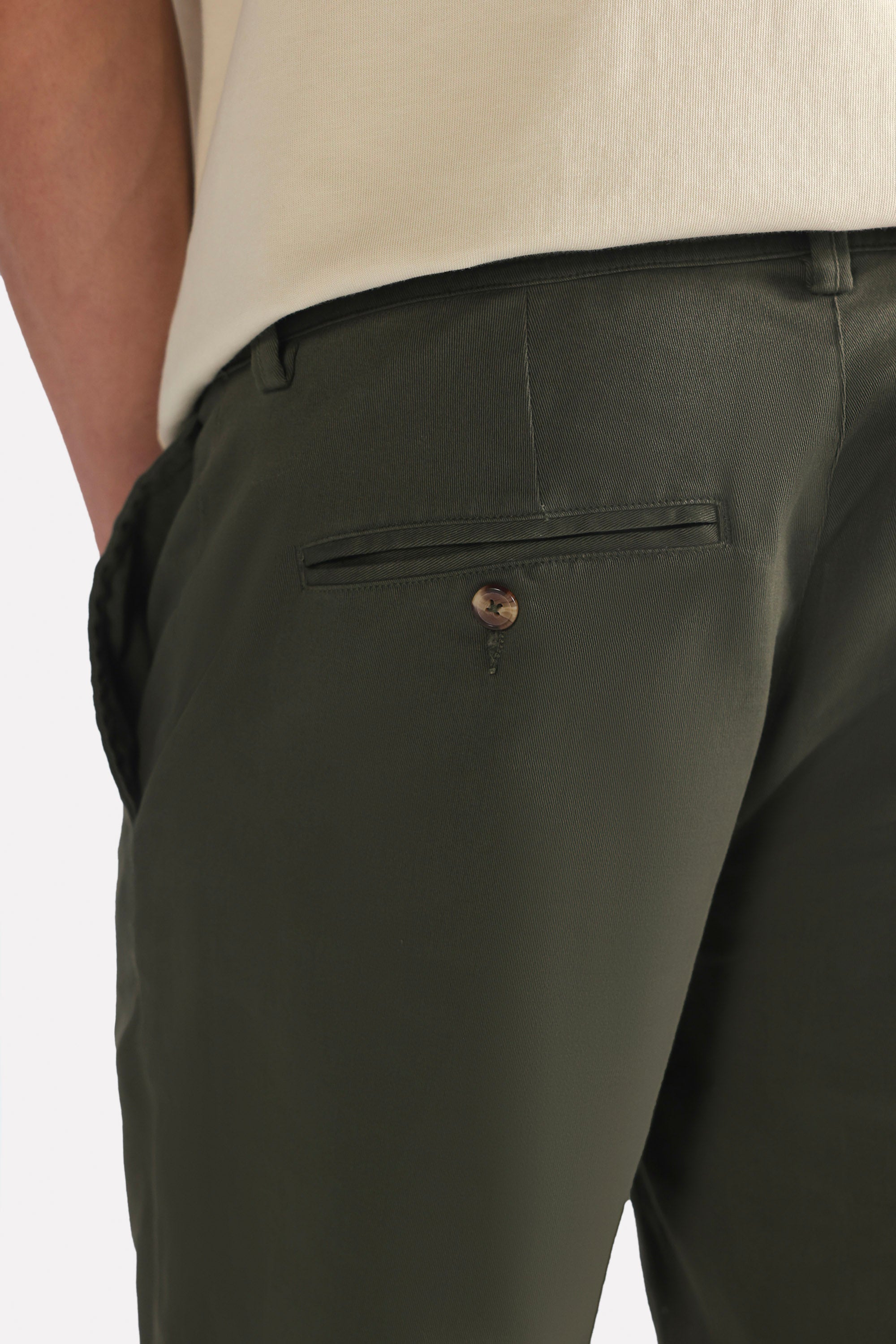 Close-up detail on the olive relaxed fit cotton shorts, by SOLA Pakistan.