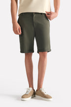 Olive relaxed fit cotton shorts, full styled look, by SOLA Pakistan.