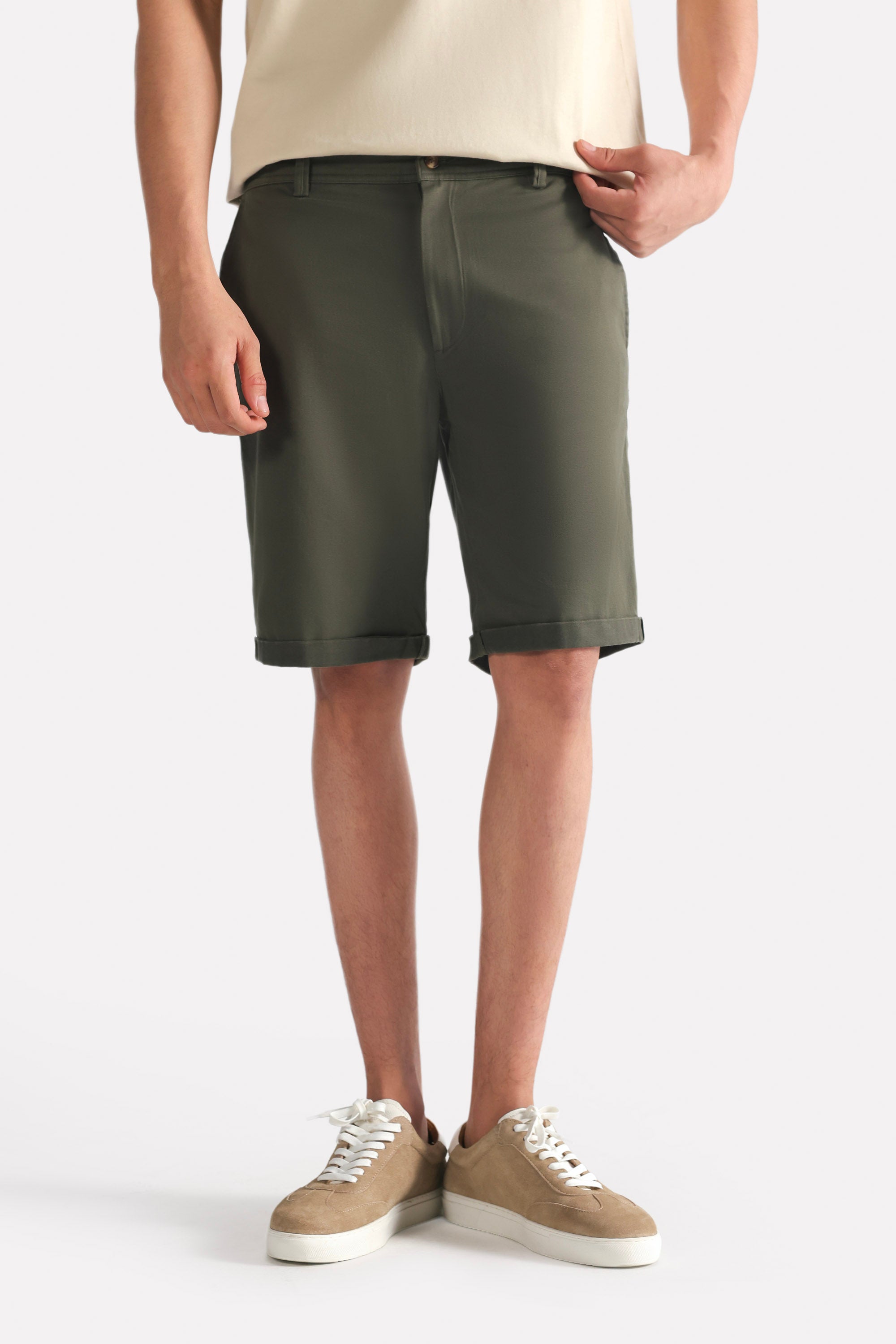 Olive relaxed fit cotton shorts, full styled look, by SOLA Pakistan.