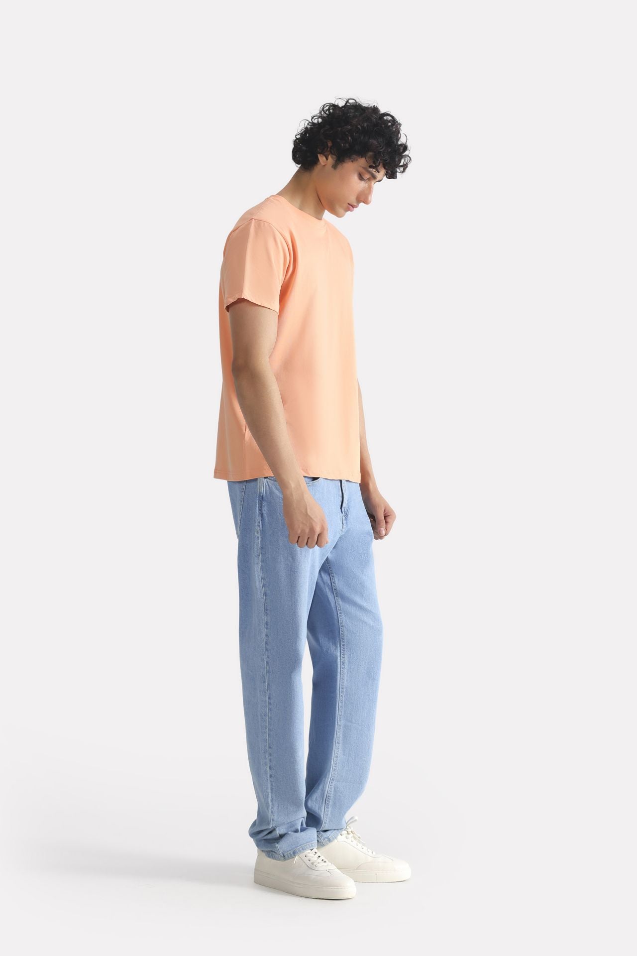 Peach (apricot) regular fit crew neck t-shirt, full styled look, by SOLA Pakistan.