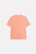 Texture and fabric detail, peach (apricot) regular fit crew neck t-shirt, by SOLA Pakistan.