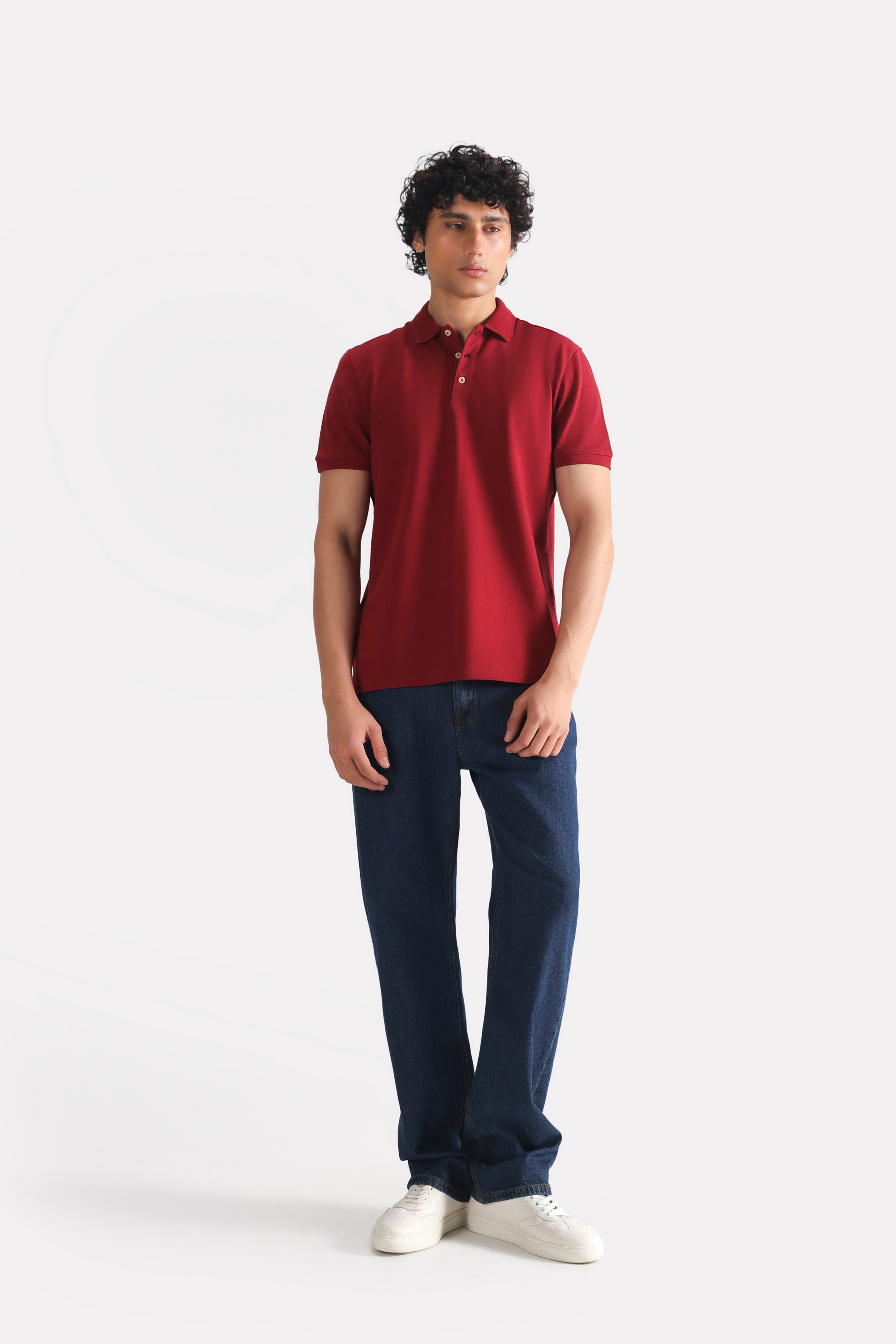 Red (red riding hood) micro-textured cotton pique polo shown in a styled fit, by SOLA Pakistan.