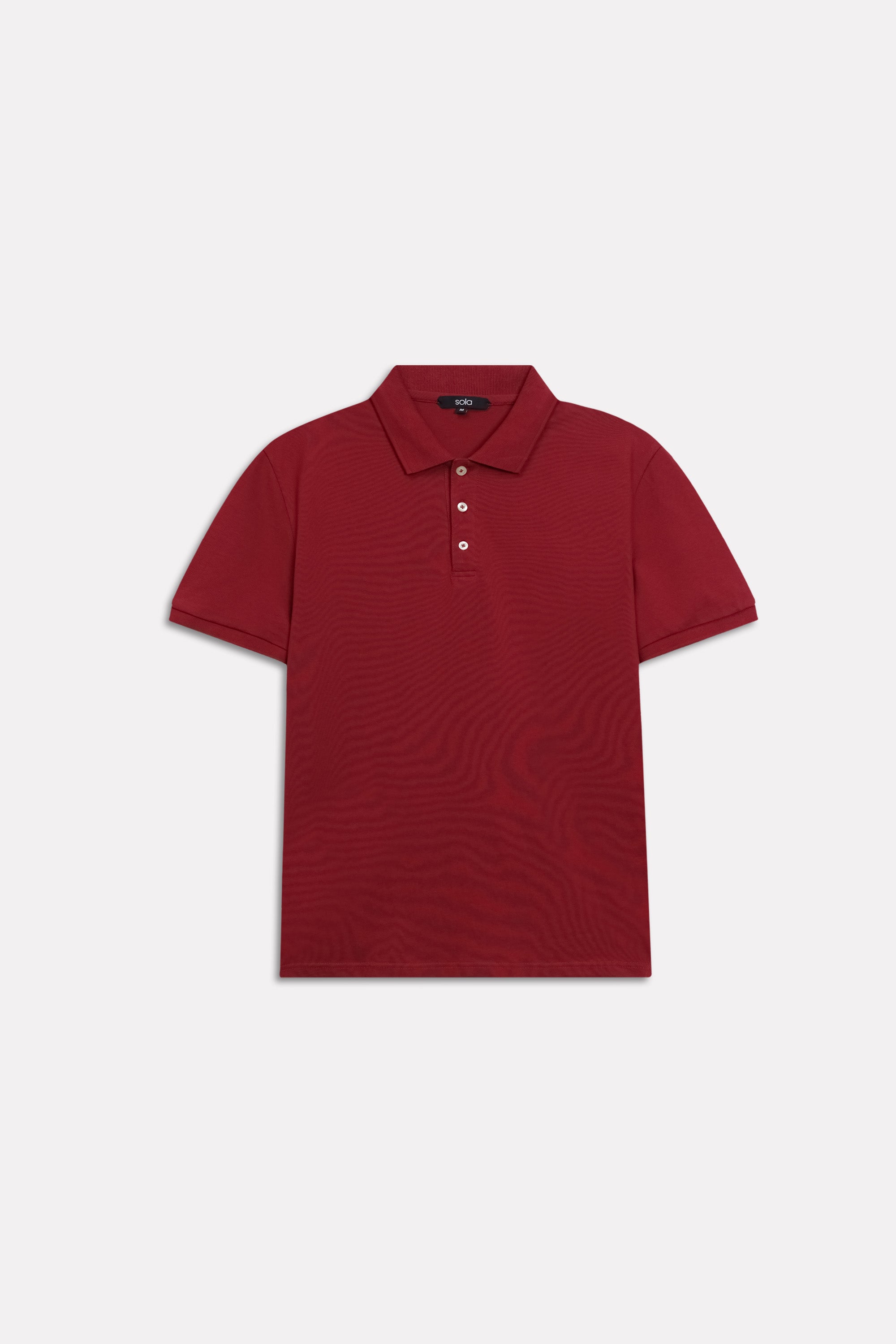 Texture and fabric detail, red (red riding hood) micro-textured cotton pique polo, by SOLA Pakistan.