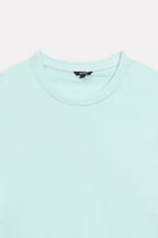 Additional view of the turquoise (tourquies) drop shoulder cotton t-shirt, by SOLA Pakistan.