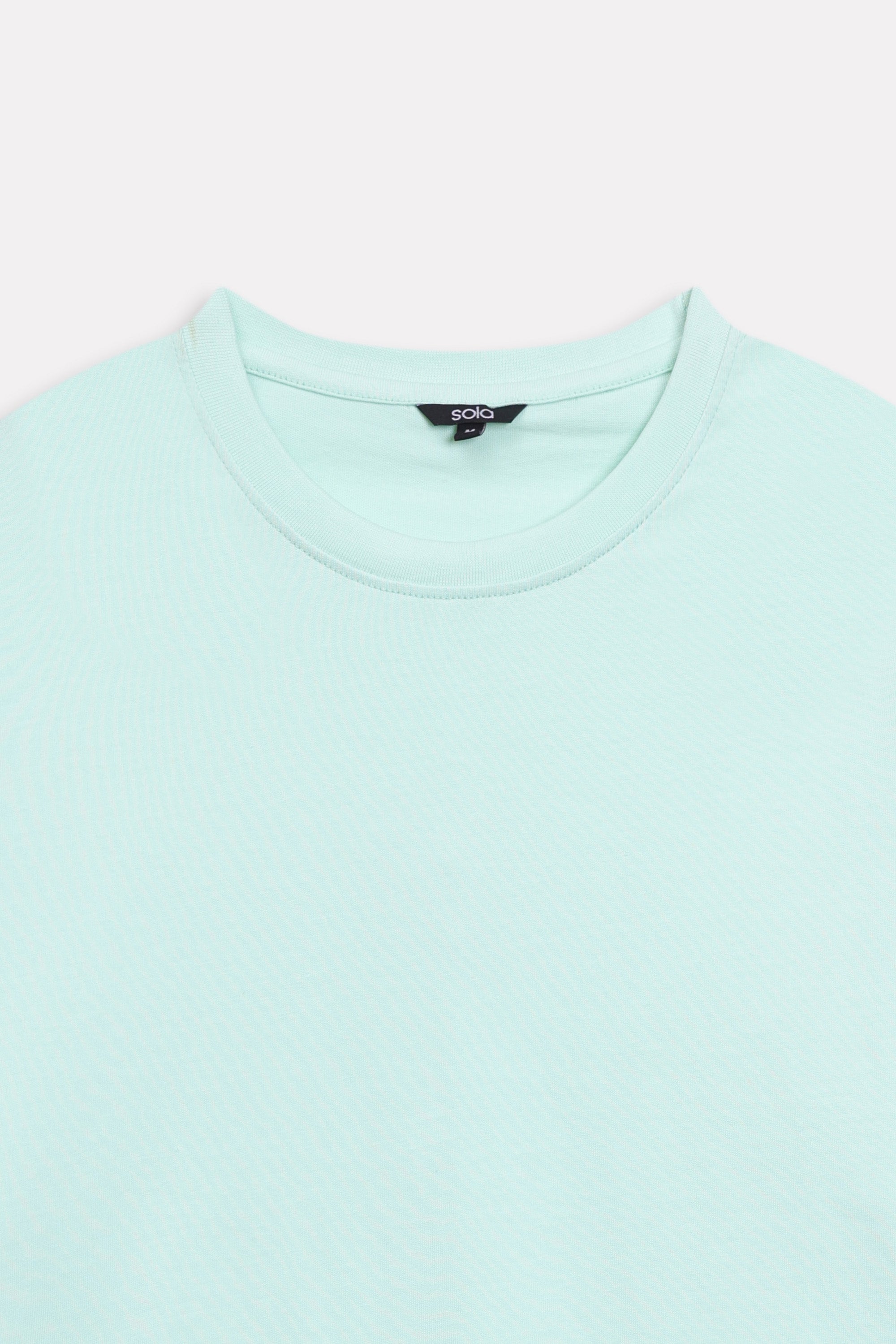 Additional view of the turquoise (tourquies) drop shoulder cotton t-shirt, by SOLA Pakistan.