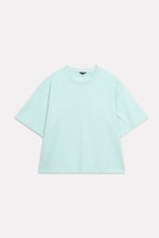 Texture and fabric detail, turquoise (tourquies) drop shoulder cotton t-shirt, by SOLA Pakistan.