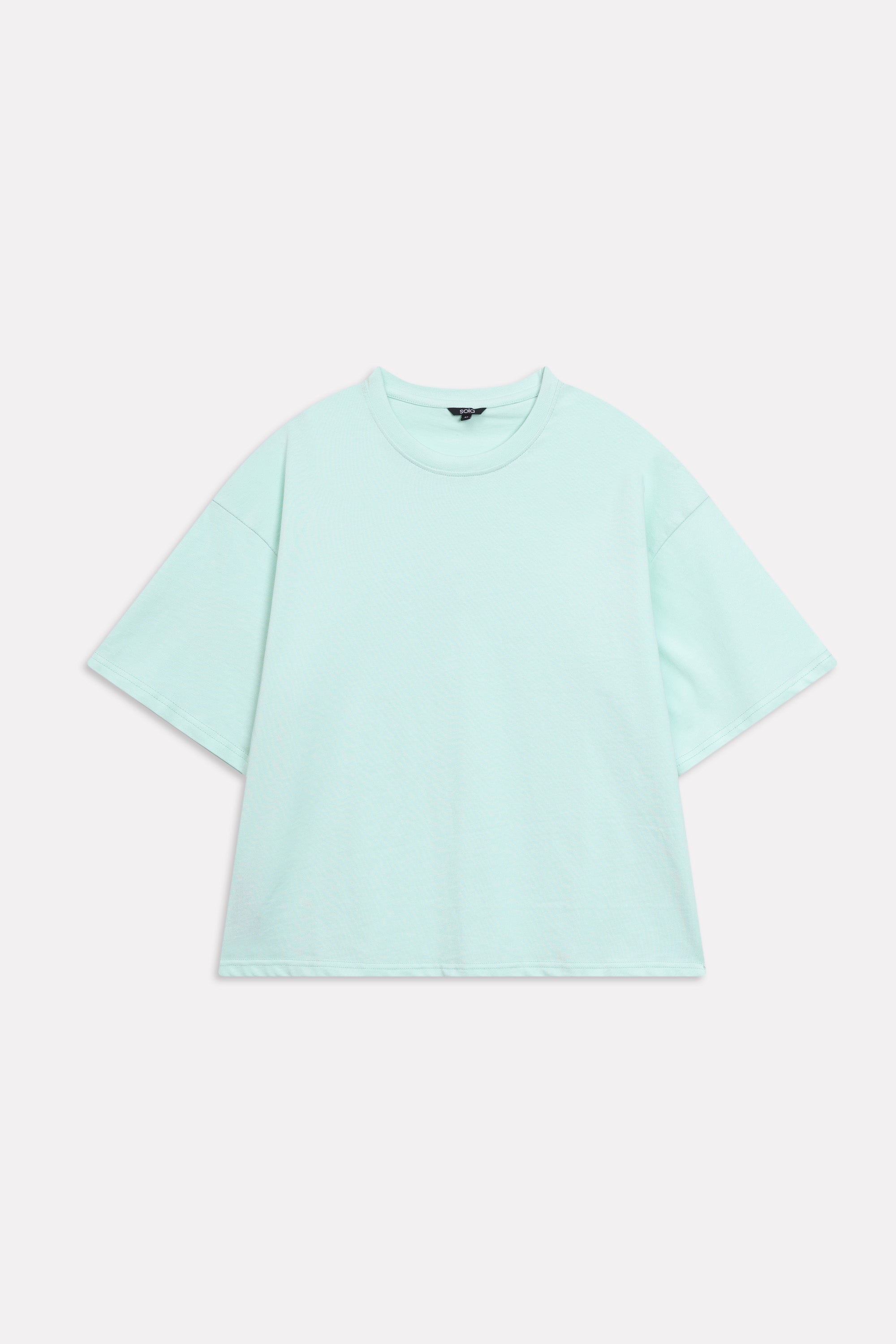 Texture and fabric detail, turquoise (tourquies) drop shoulder cotton t-shirt, by SOLA Pakistan.