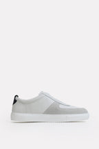 White classic leather trainer, by SOLA Pakistan.