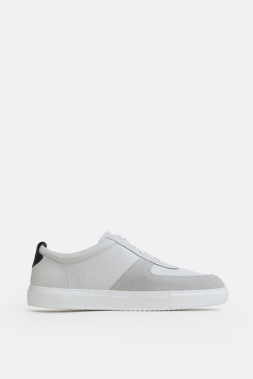 White classic leather trainer, by SOLA Pakistan.