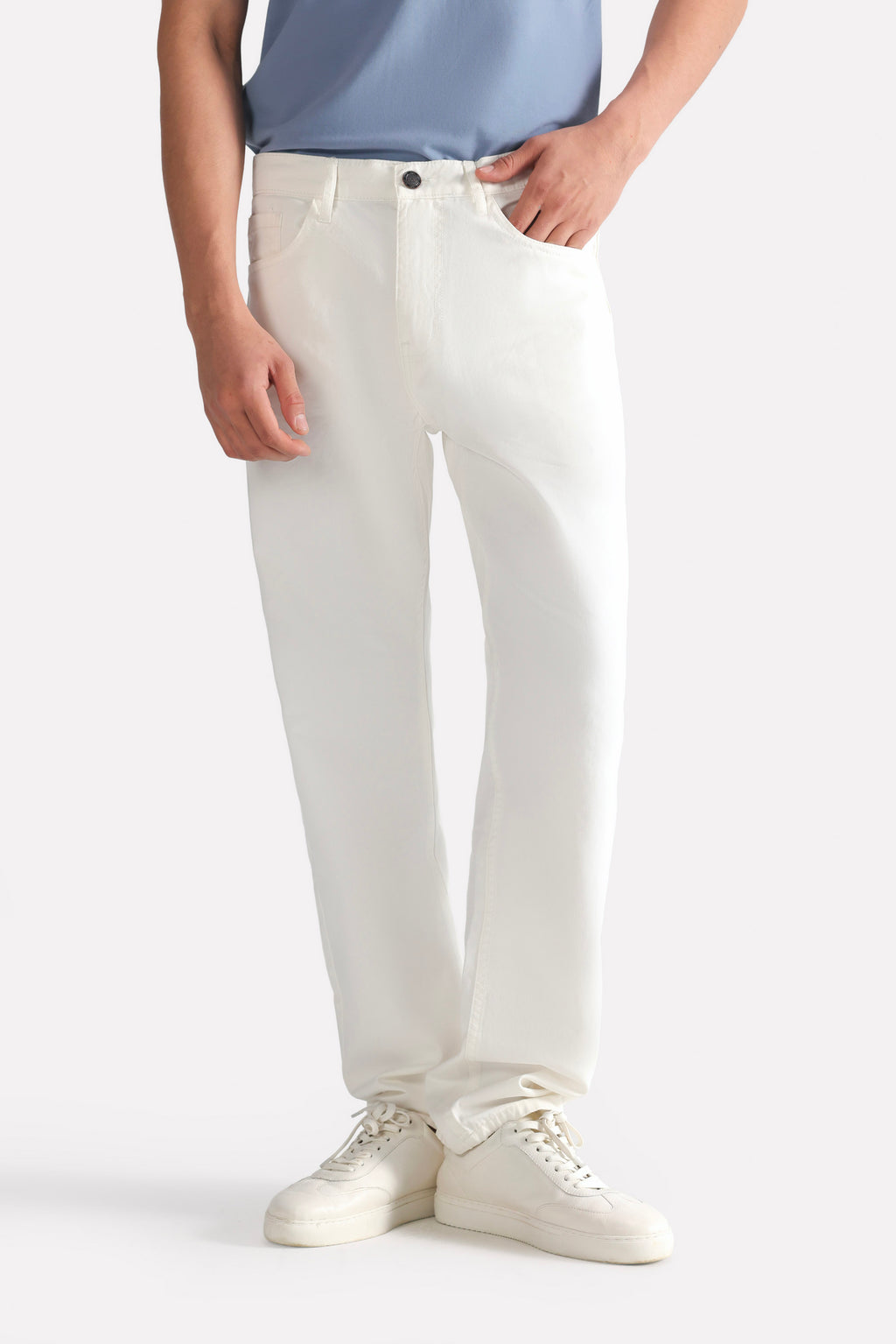 White garment-dyed casual trouser, full styled look, by SOLA Pakistan.
