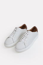White leather trainers-detailed heel, full styled look, by SOLA Pakistan.