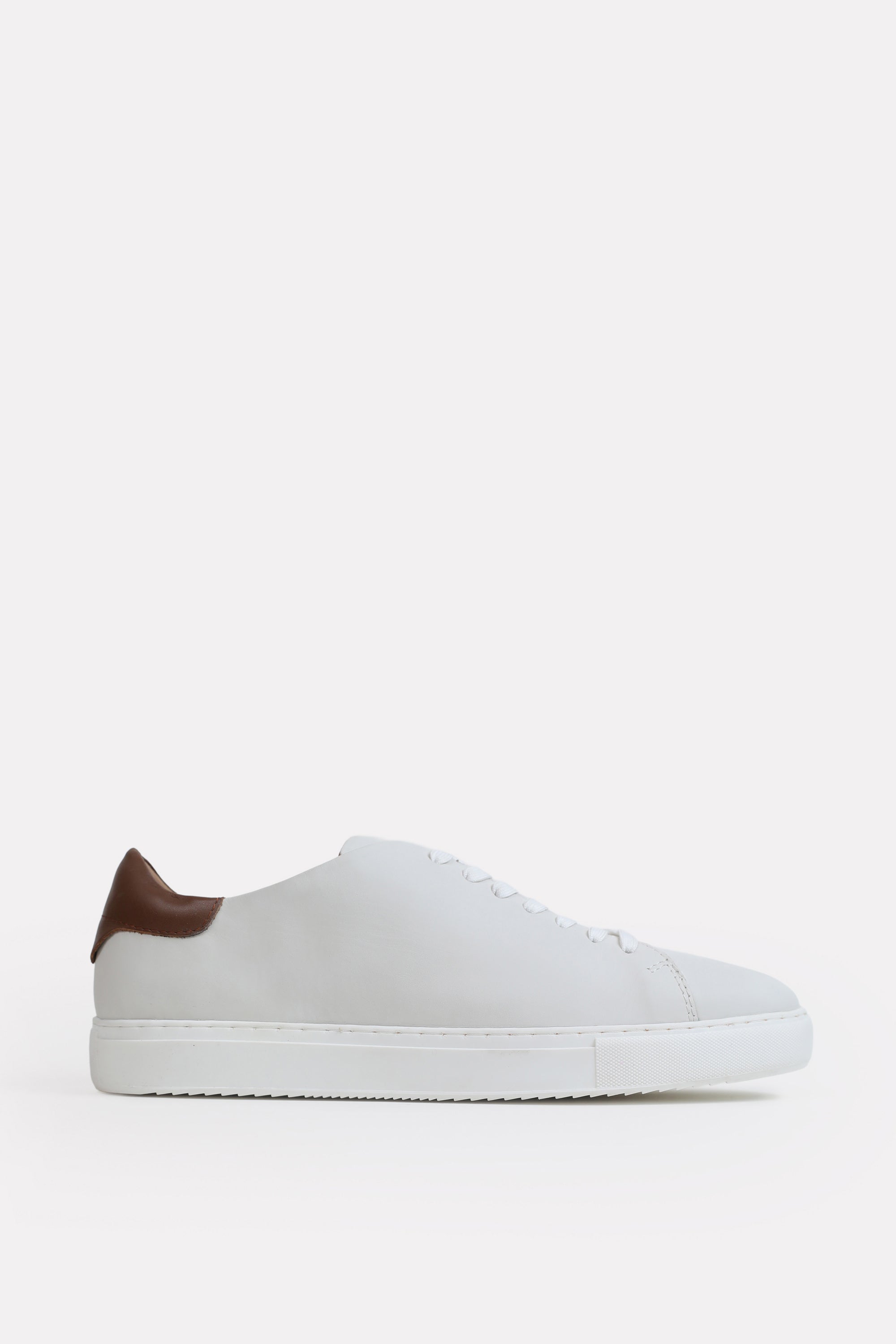 White leather trainers-detailed heel, by SOLA Pakistan.