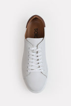White leather trainers-detailed heel shown in detail, by SOLA Pakistan.