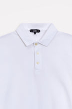 Texture and fabric detail, white micro-textured cotton pique polo, by SOLA Pakistan.