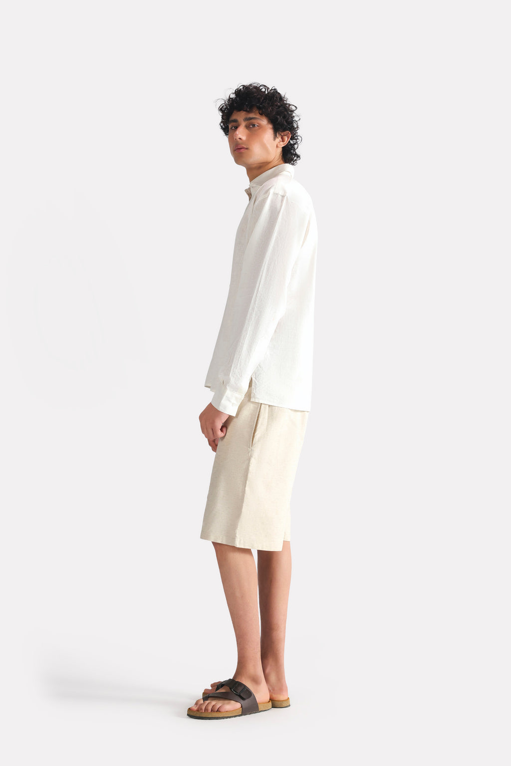 White pop over half-placket shirt, full styled look, by SOLA Pakistan.