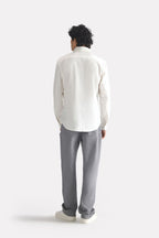 Flat lay of the white premium cotline shirt, by SOLA Pakistan.