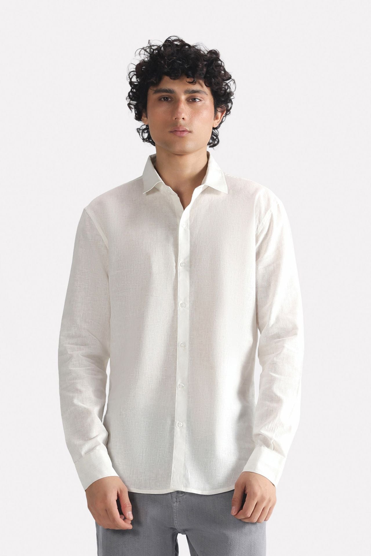 White premium cotline shirt in cotton-linen blend, worn by a model, by SOLA Pakistan.