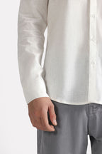 White premium cotline shirt shown in a styled fit, by SOLA Pakistan.