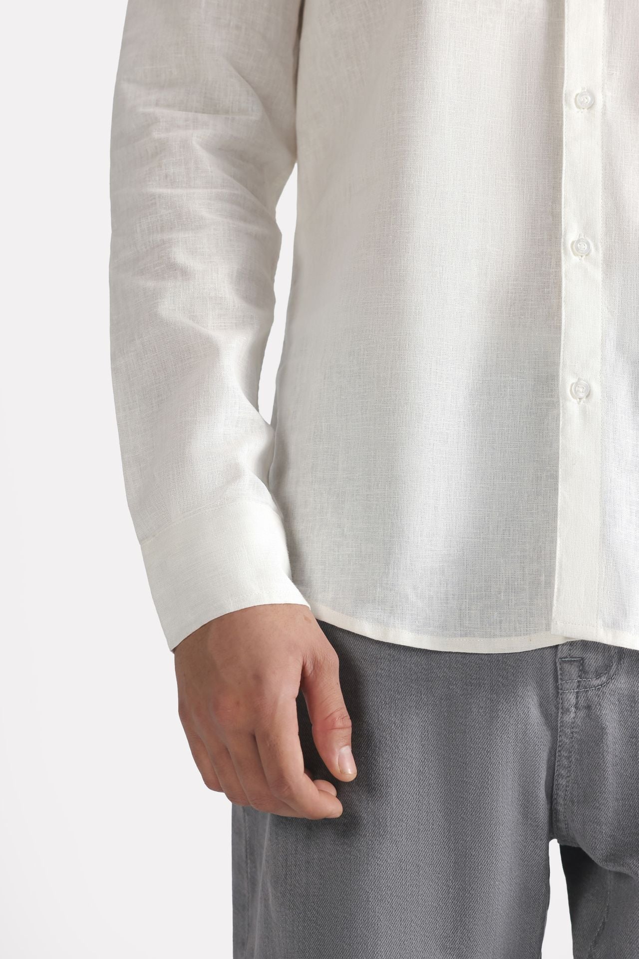 White premium cotline shirt shown in a styled fit, by SOLA Pakistan.