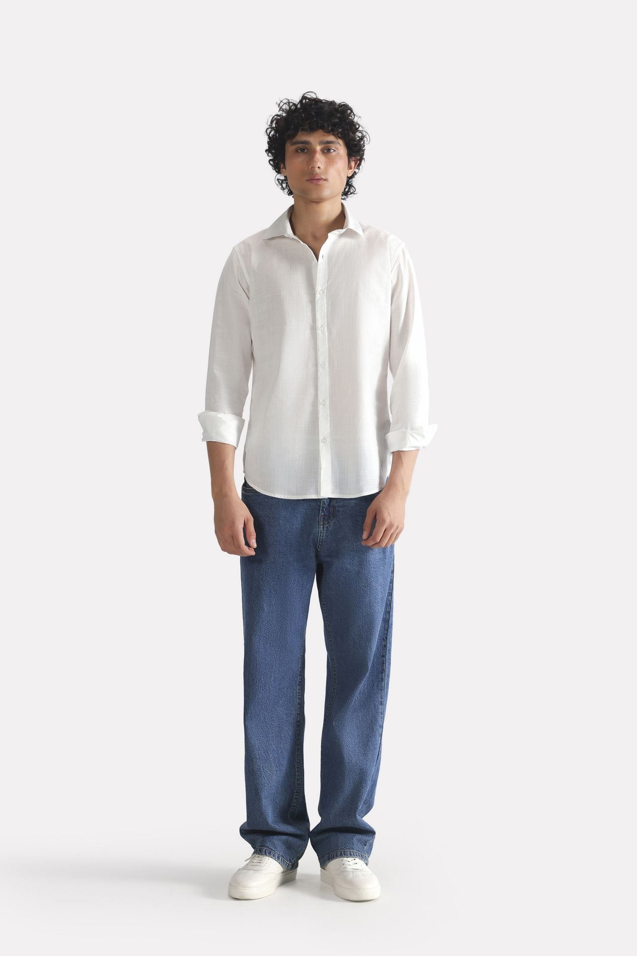 Close-up detail on the white regular fit cotton shirt, by SOLA Pakistan.