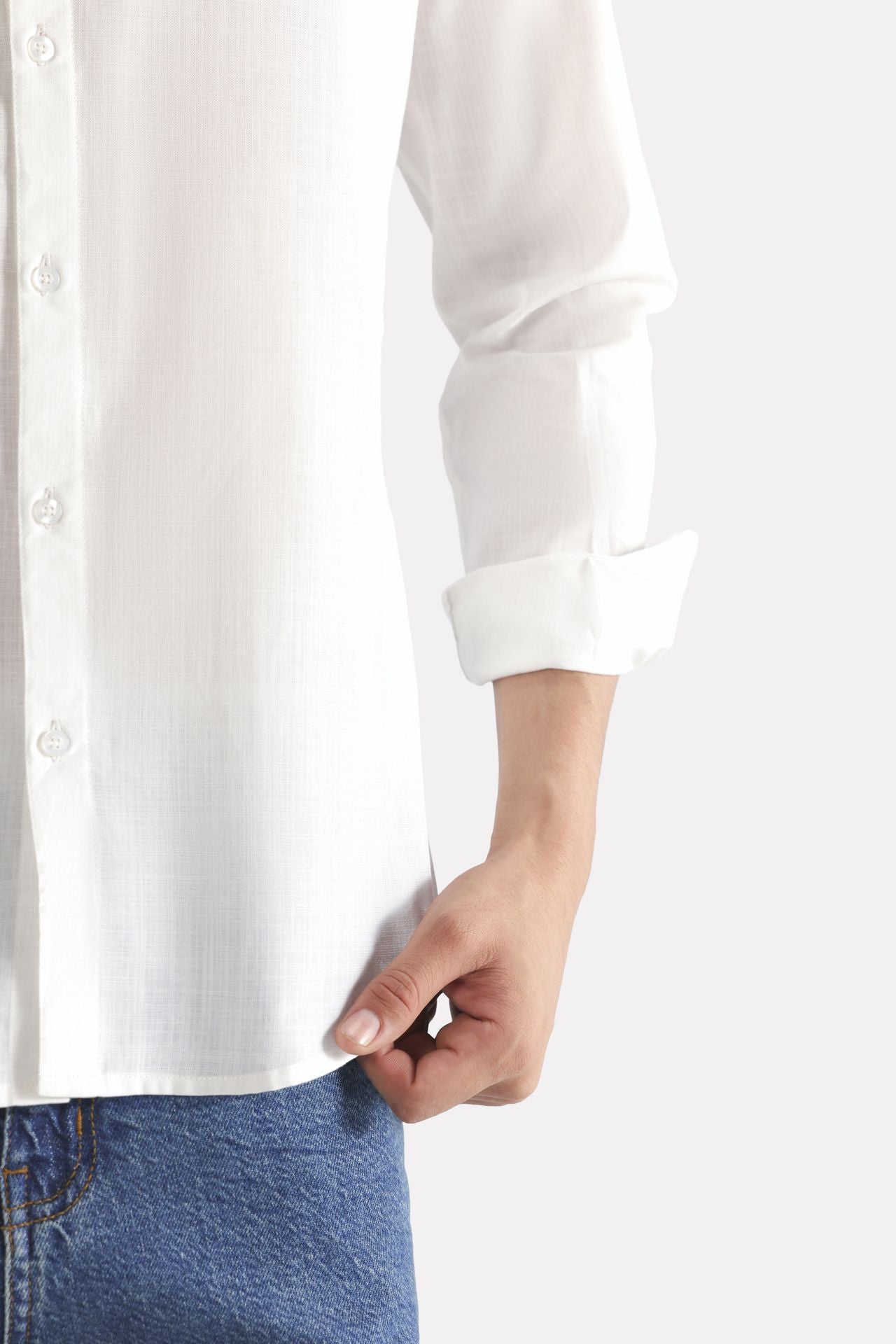 White regular fit cotton shirt shown in a styled fit, by SOLA Pakistan.