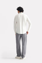 Flat lay of the white regular fit pique shirt, by SOLA Pakistan.