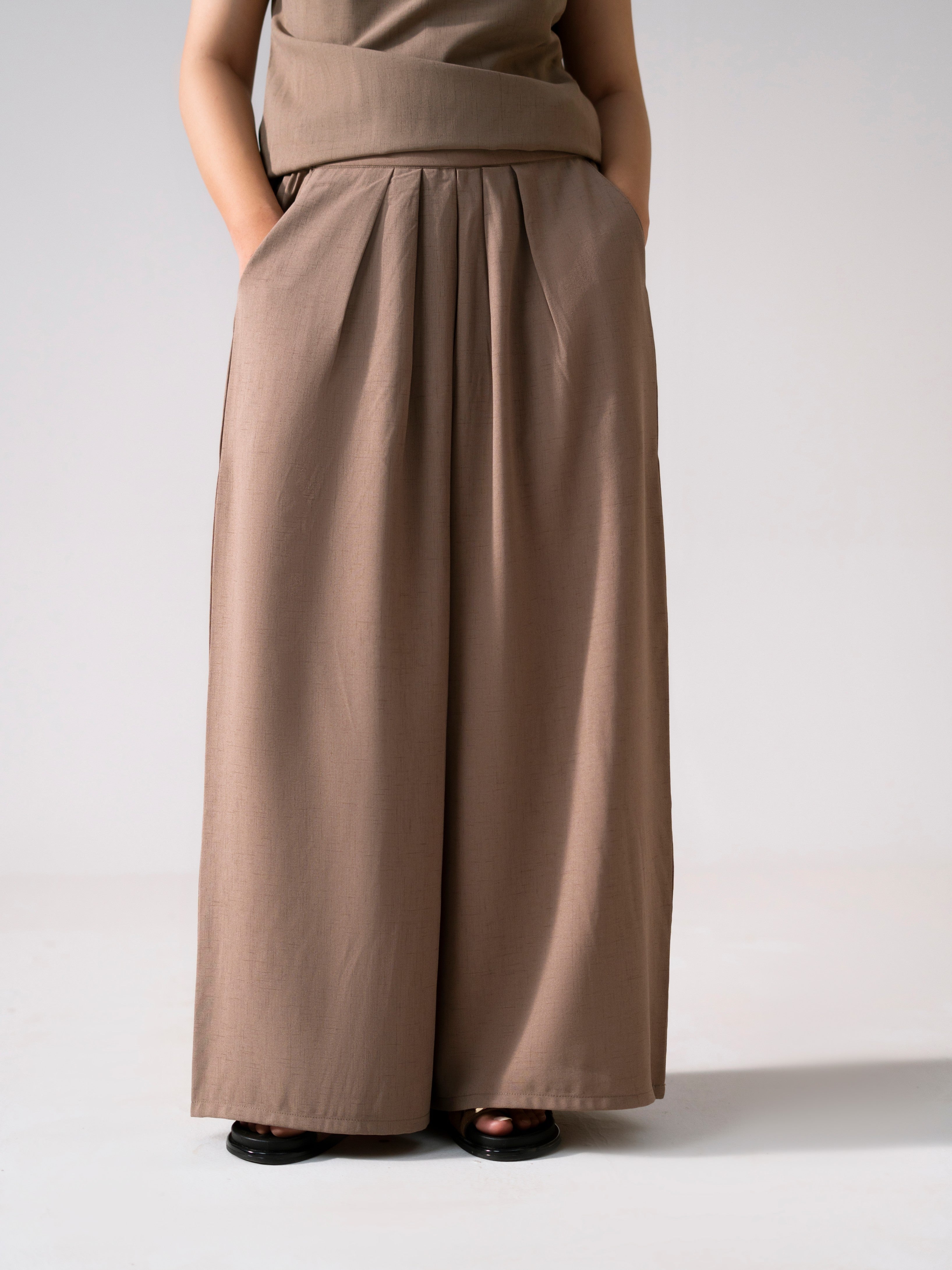 Beige cozy chic co-ord bottom, full styled look, by SOLA Pakistan.