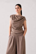 Beige cozy chic co-ord top in cotton-linen blend, worn by a model, by SOLA Pakistan.