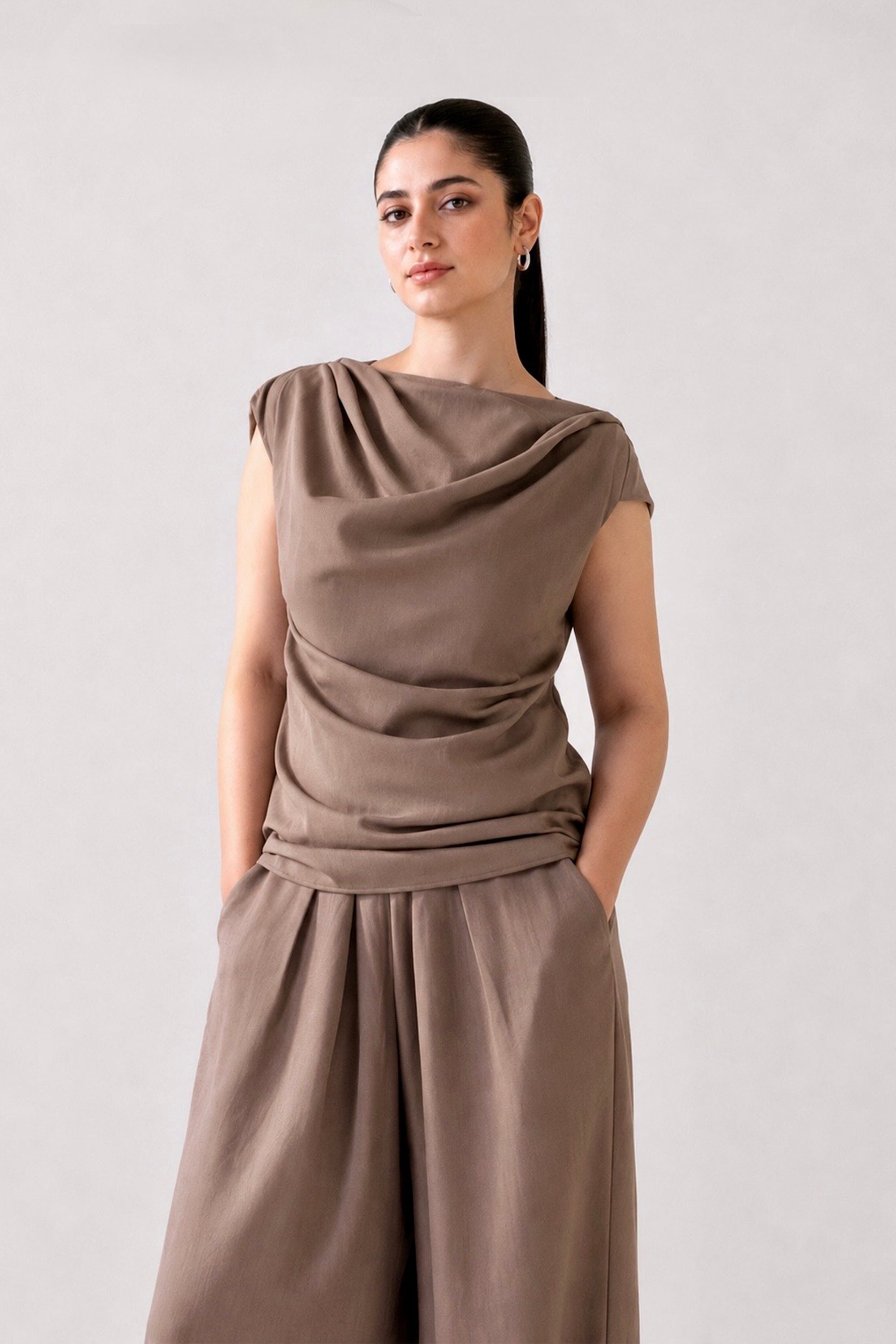 Beige cozy chic co-ord top in cotton-linen blend, worn by a model, by SOLA Pakistan.
