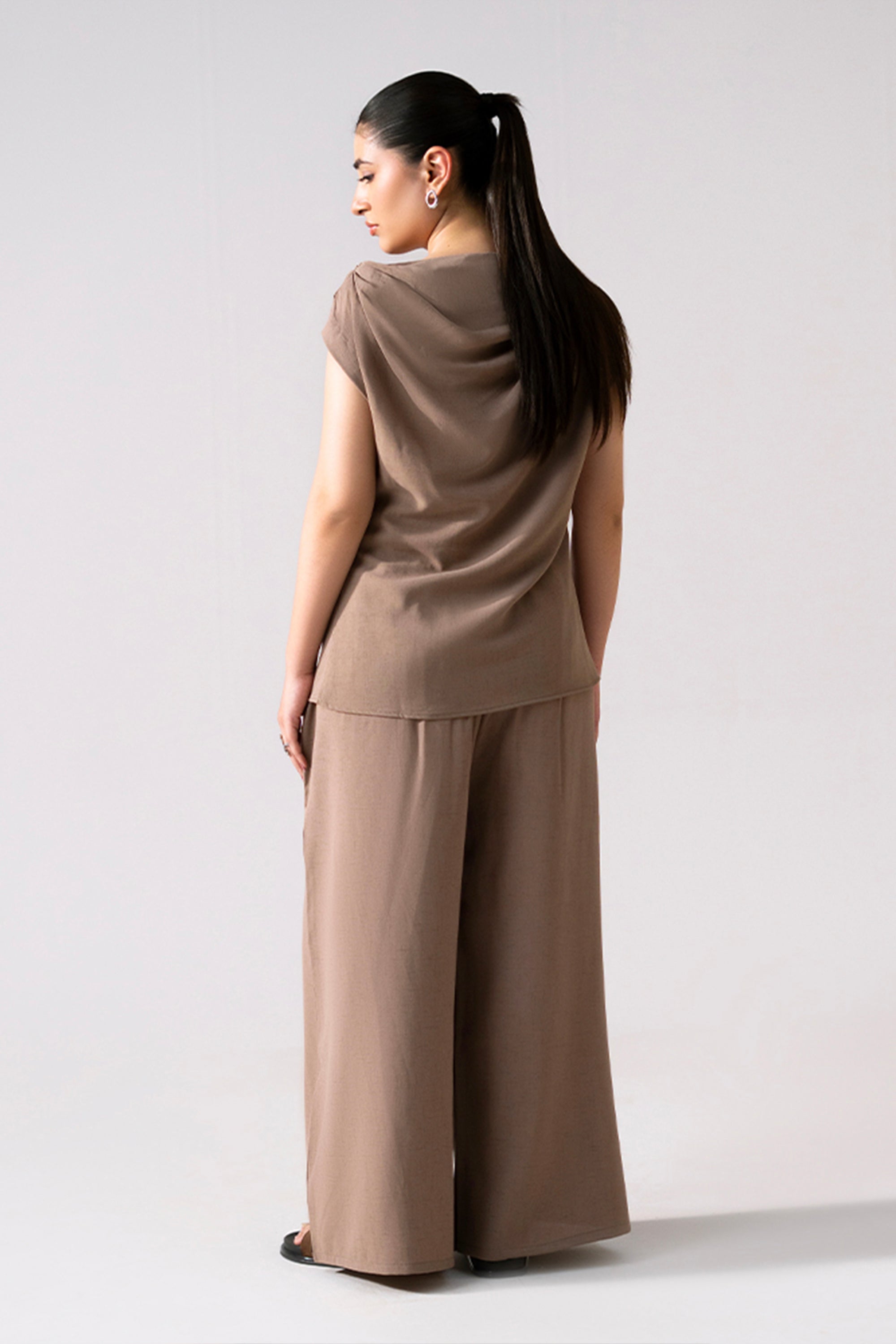 Beige cozy chic co-ord top shown in a styled fit, by SOLA Pakistan.