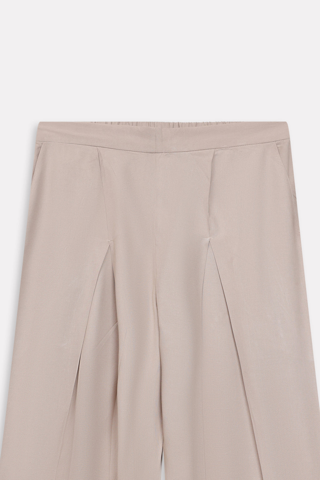 Beige pleated co-ord bottom, alternate angle, by SOLA Pakistan.