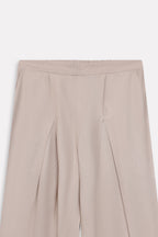 Beige pleated co-ord bottom, alternate angle, by SOLA Pakistan.