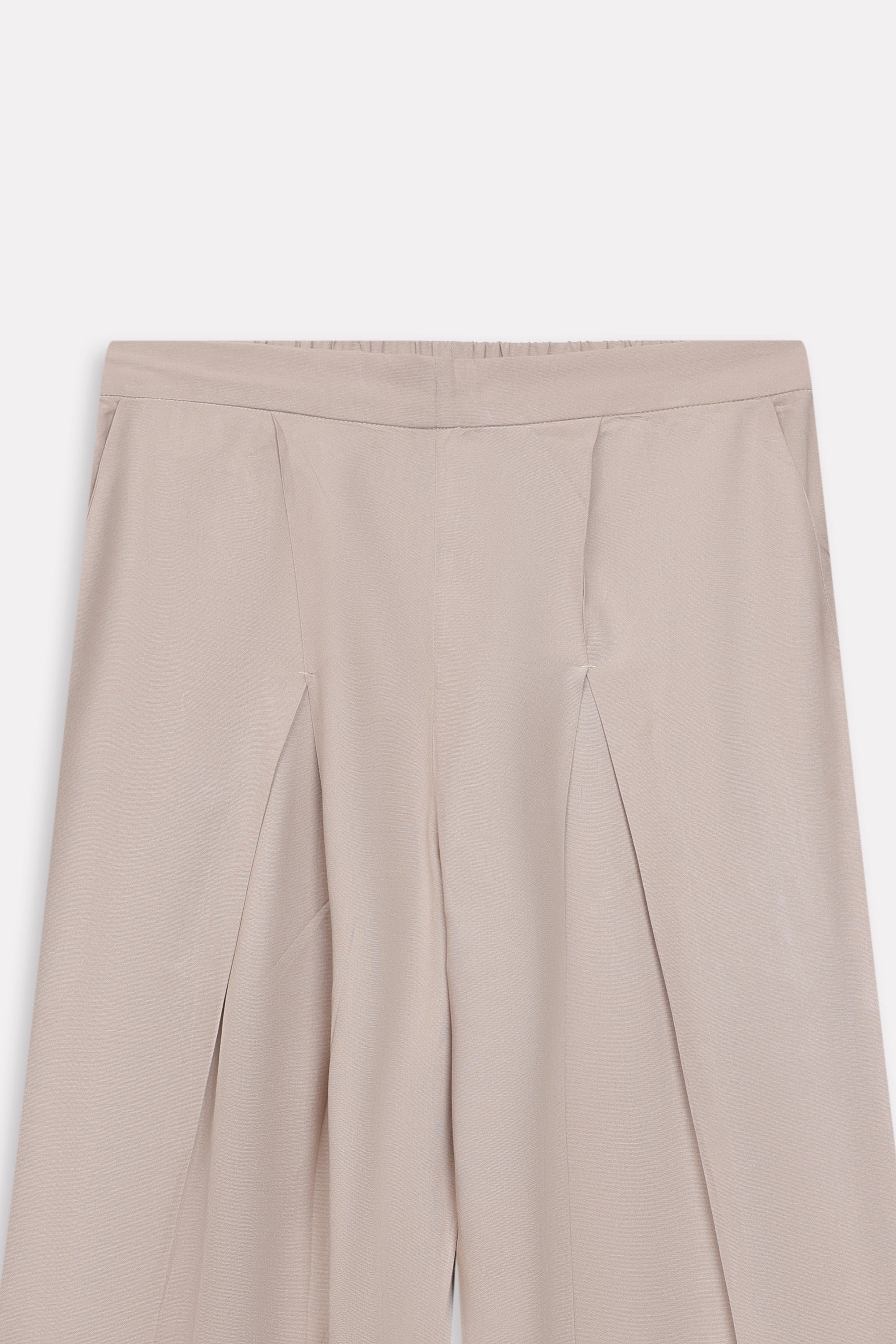 Beige pleated co-ord bottom, alternate angle, by SOLA Pakistan.