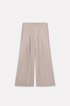 Close-up detail on the beige pleated co-ord bottom, by SOLA Pakistan.