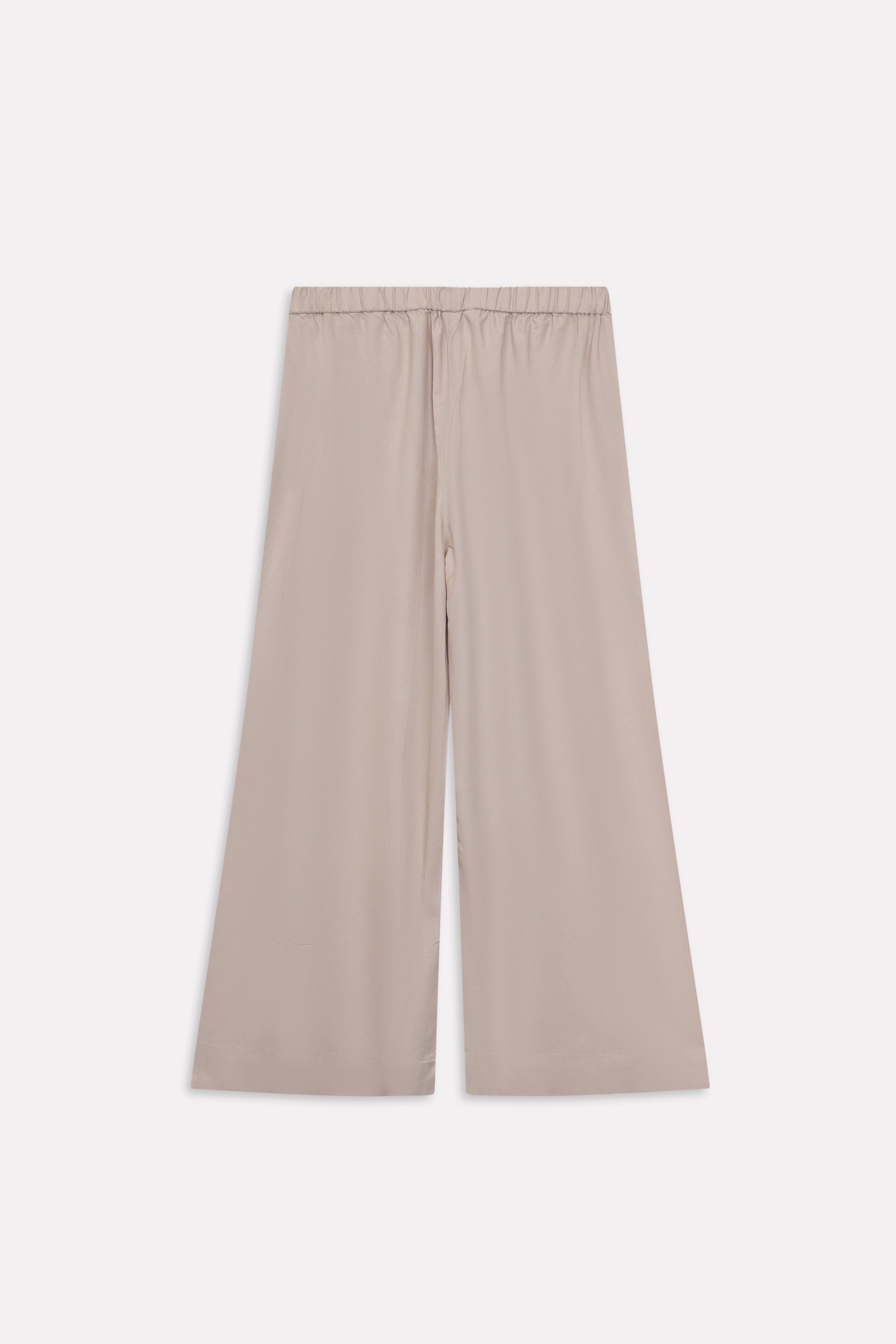 Beige pleated co-ord bottom shown in a styled fit, by SOLA Pakistan.