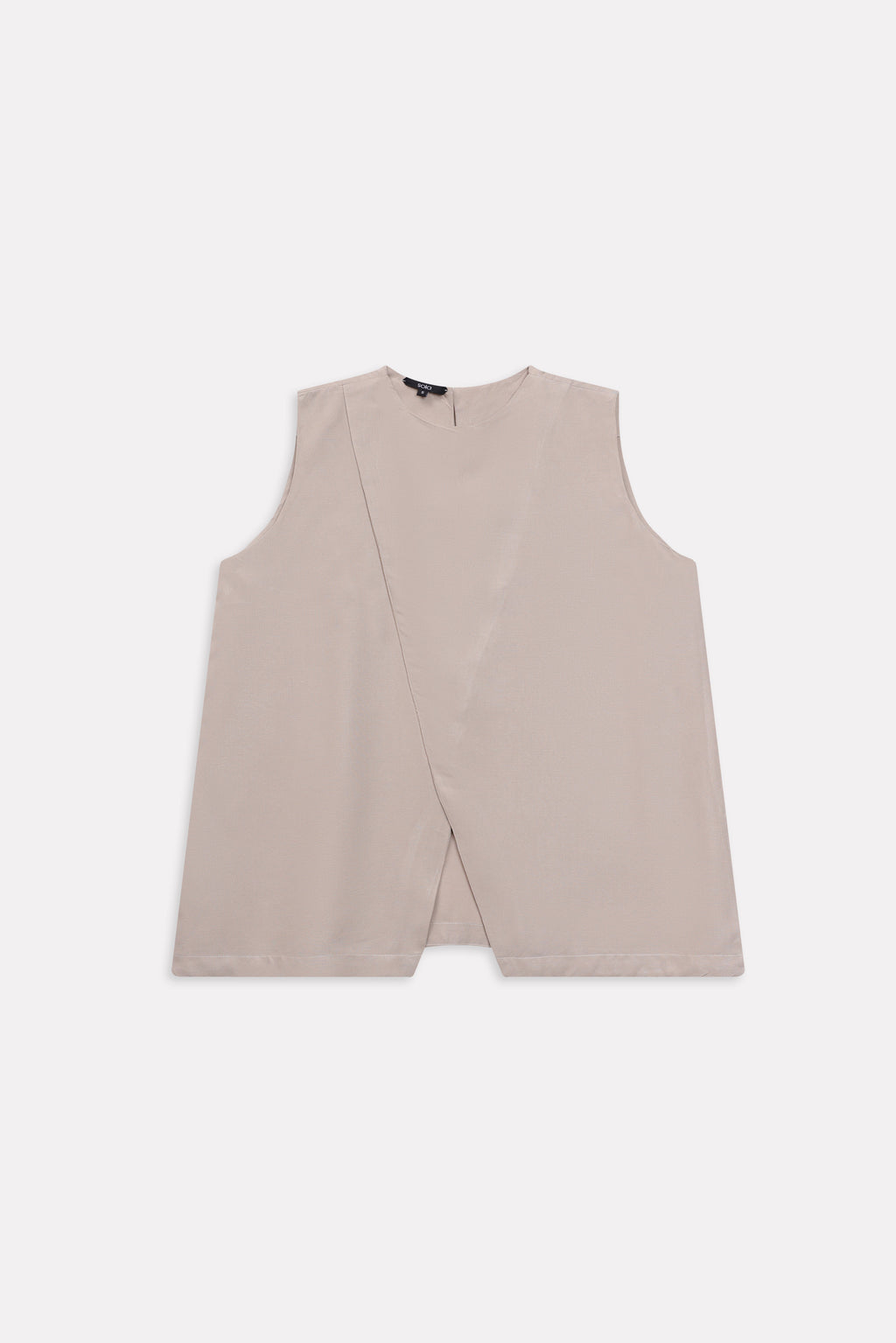 Flat lay of the beige pleated co-ord top, by SOLA Pakistan.