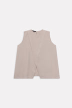 Flat lay of the beige pleated co-ord top, by SOLA Pakistan.