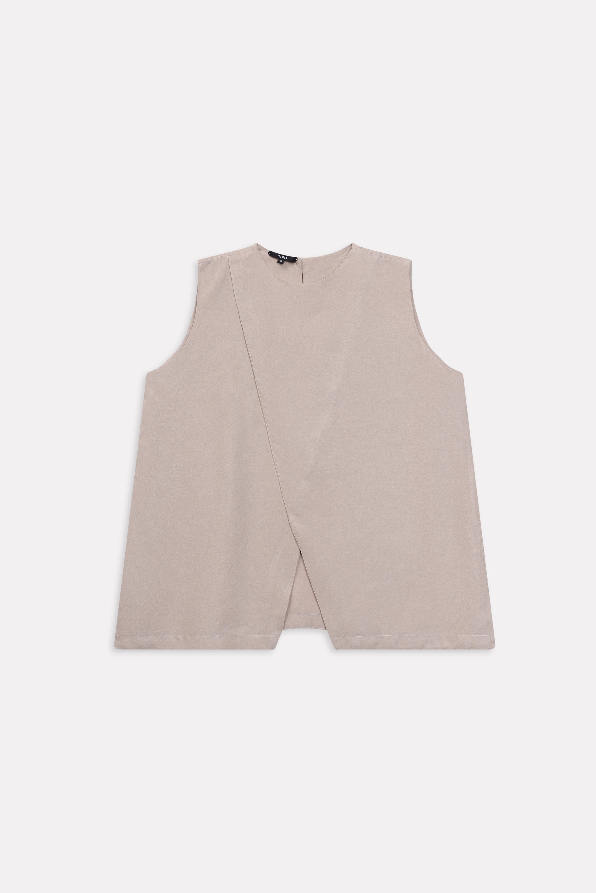 Flat lay of the beige pleated co-ord top, by SOLA Pakistan.