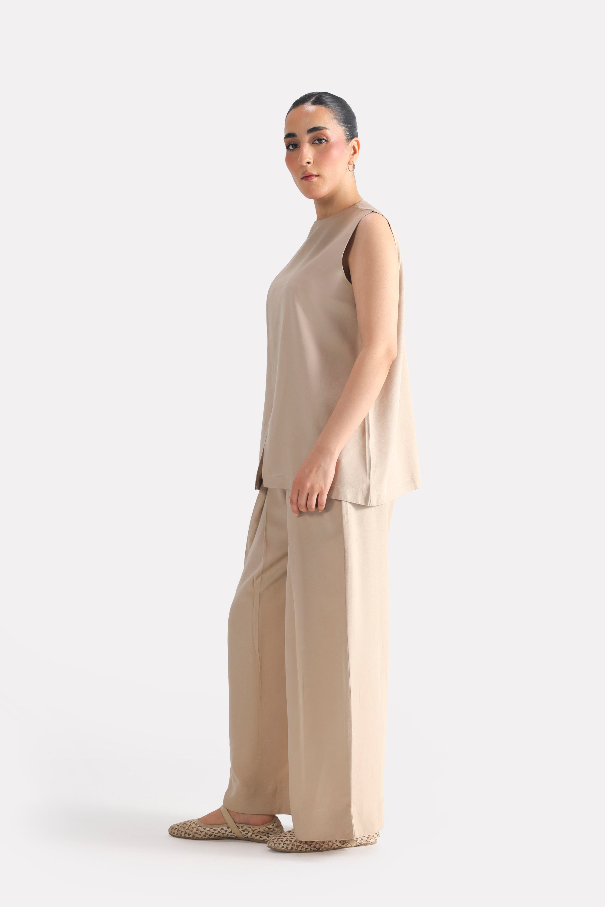 Beige pleated co-ord top, full styled look, by SOLA Pakistan.