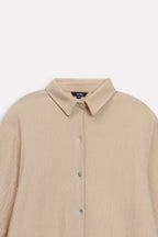 Beige pleated hem woven top, alternate angle, by SOLA Pakistan.