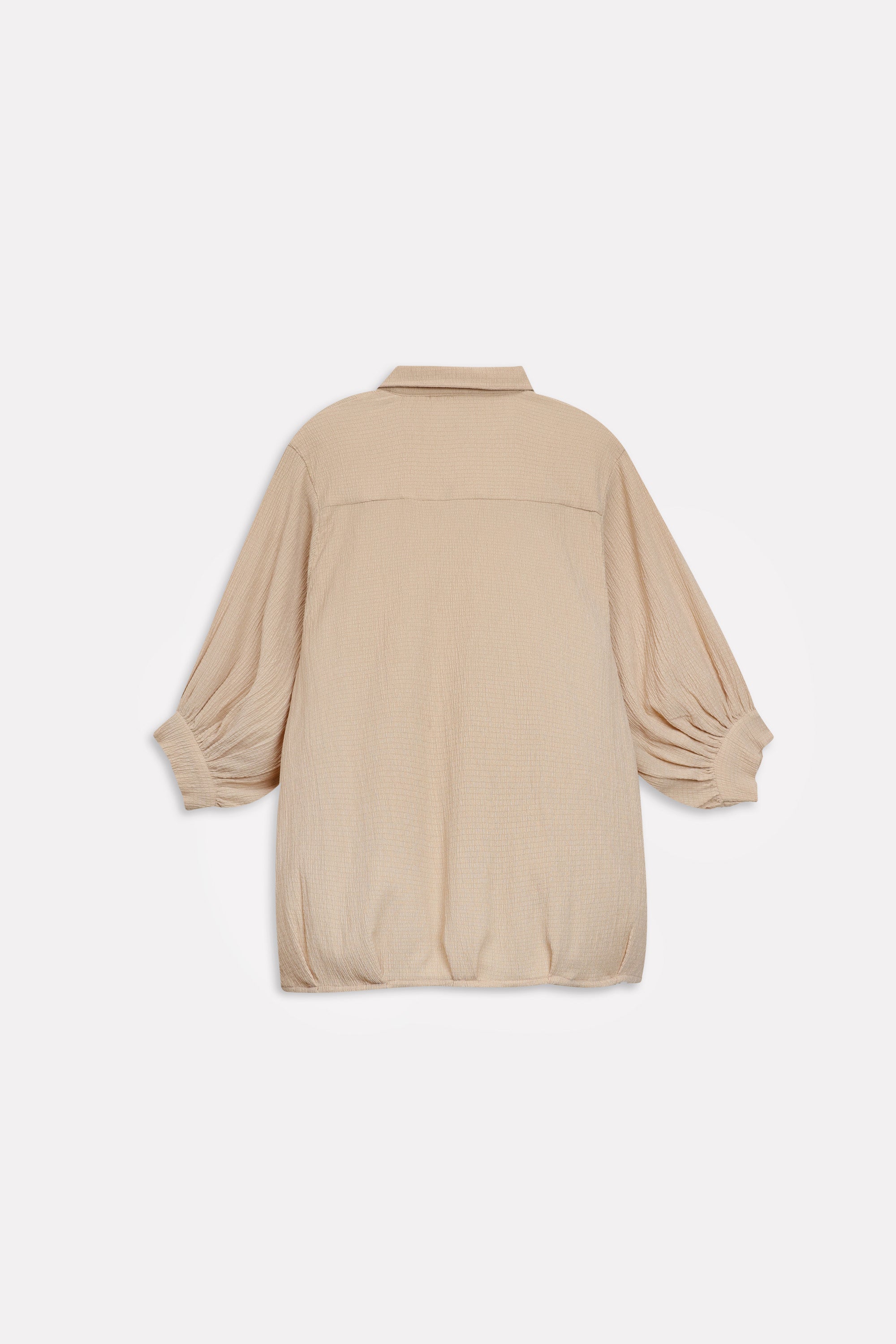 Beige pleated hem woven top shown in a styled fit, by SOLA Pakistan.