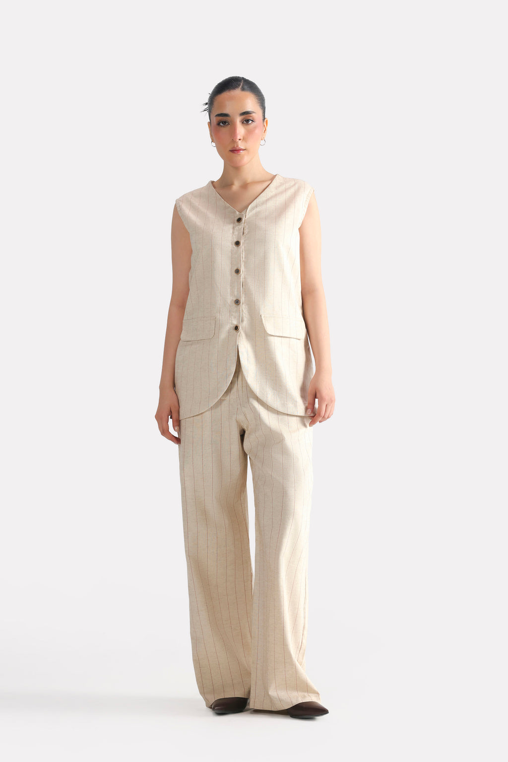 Beige print linen blend tailored co-ord bottom, worn by a model, by SOLA Pakistan.