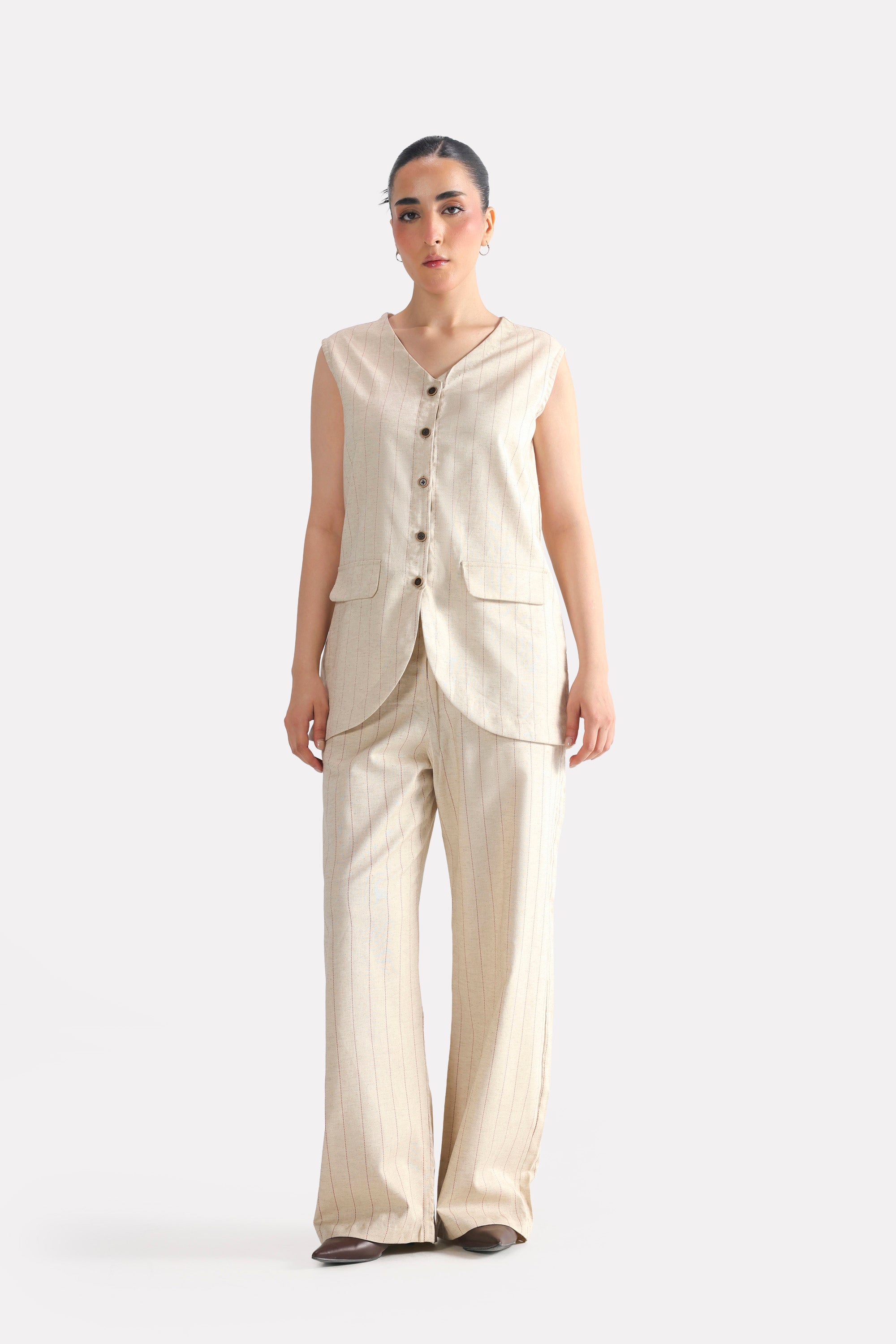 Close-up detail on the beige print linen blend tailored co-ord top, by SOLA Pakistan.