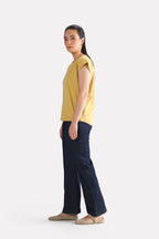 Beige relaxed shoulder-tab t-shirt, full styled look, by SOLA Pakistan.