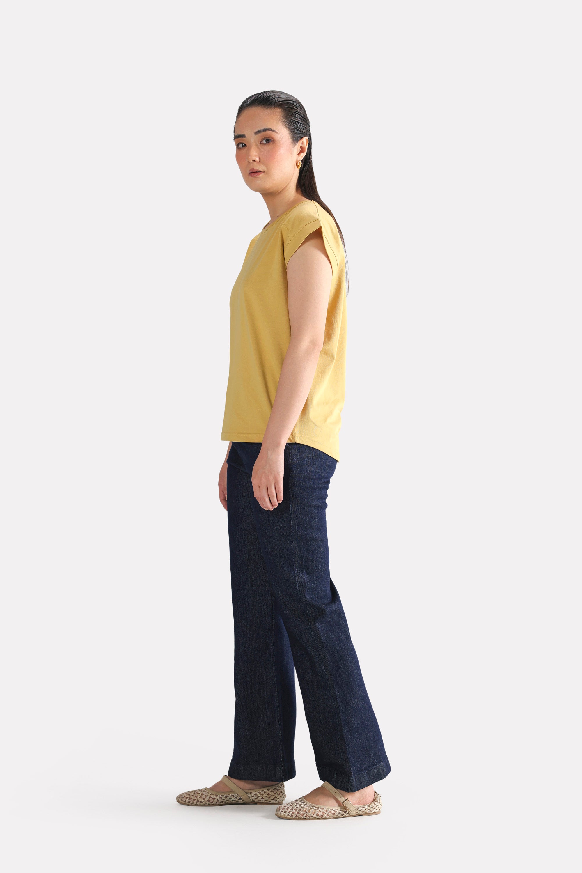 Beige relaxed shoulder-tab t-shirt, full styled look, by SOLA Pakistan.