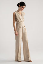 Beige sleeveless wrap style wide leg jumpsuit co-ord, full styled look, by SOLA Pakistan.