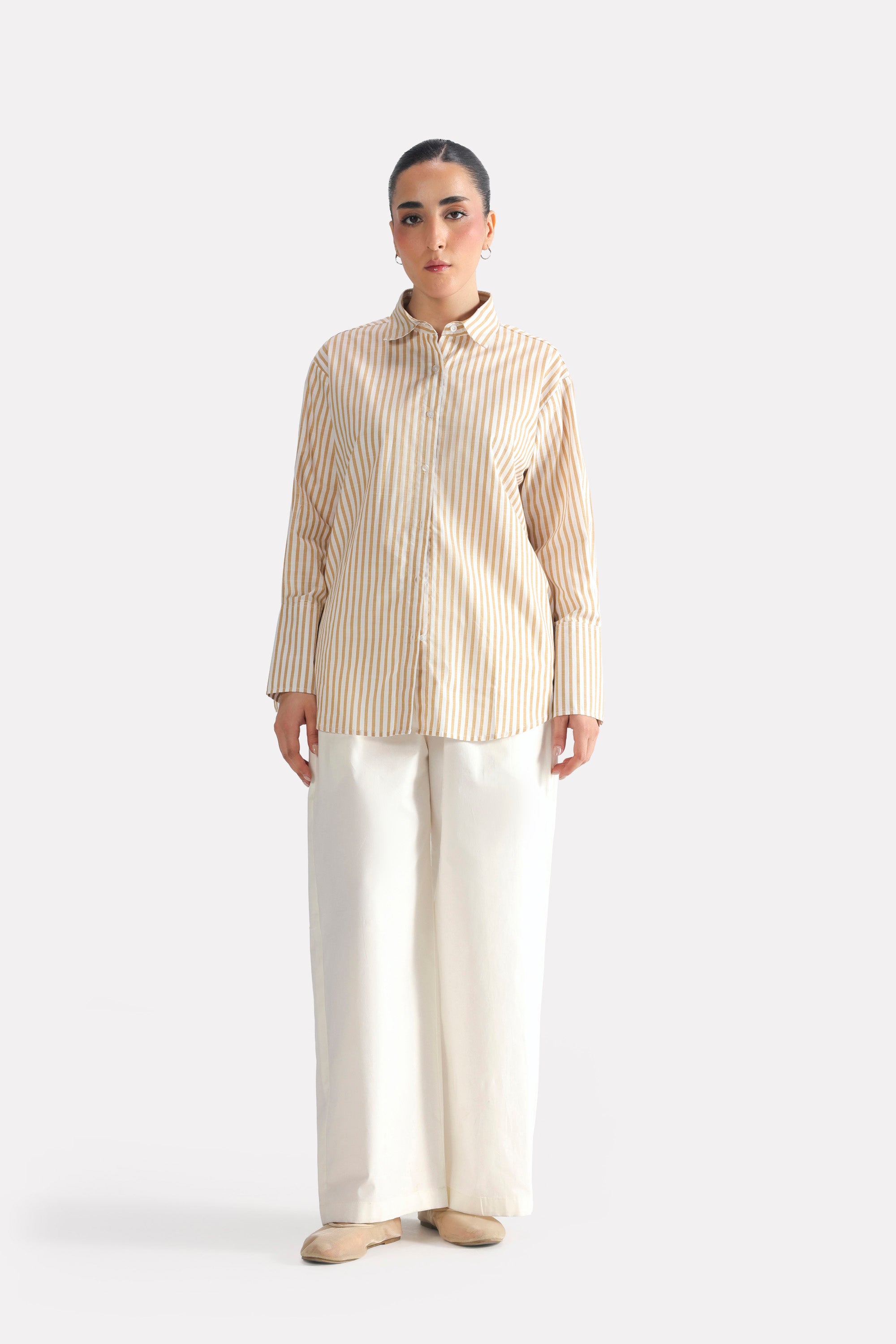 Close-up detail on the beige & white stripe button-up stripe shirt, by SOLA Pakistan.